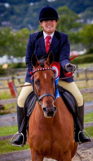 kat williams-jones on a retrained racehorse winning a dressage competition for an event for retraining of racehorses (ror) in gloucesershire